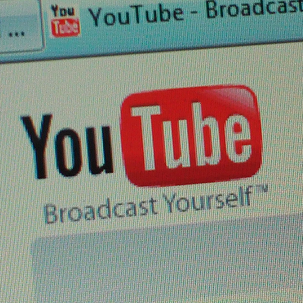 Youtube logo (adapted) (Image by Andrew Perry [CC BY 2.0] via Flickr)