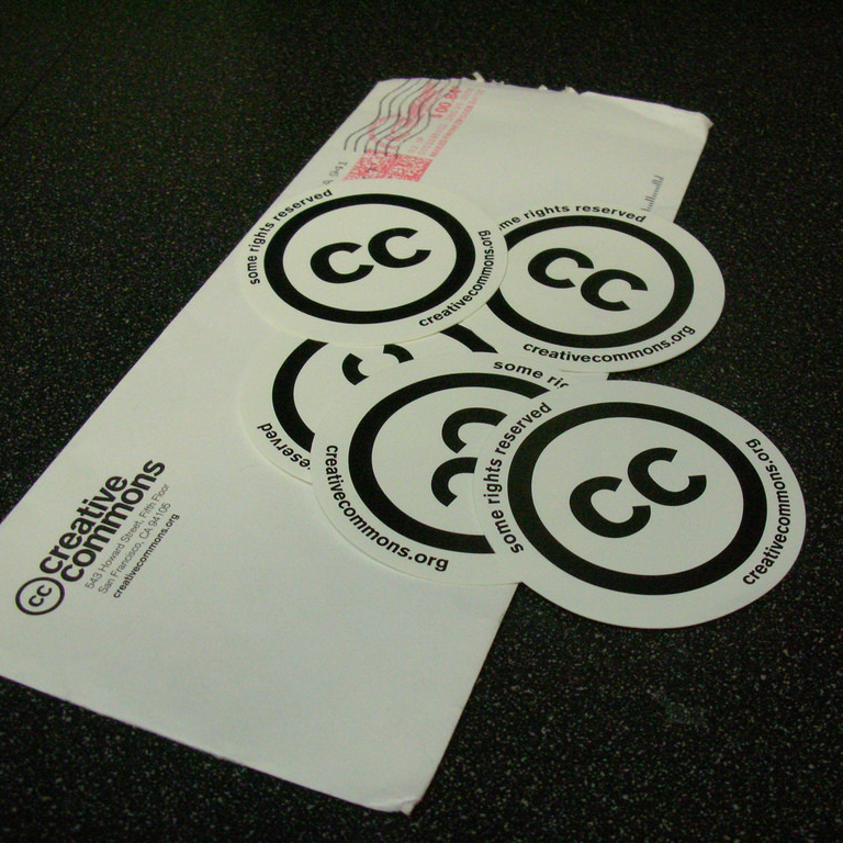 Creative Commons stickers (adapted) (Image by oswaldo [CC BY 2.0] via Flickr)