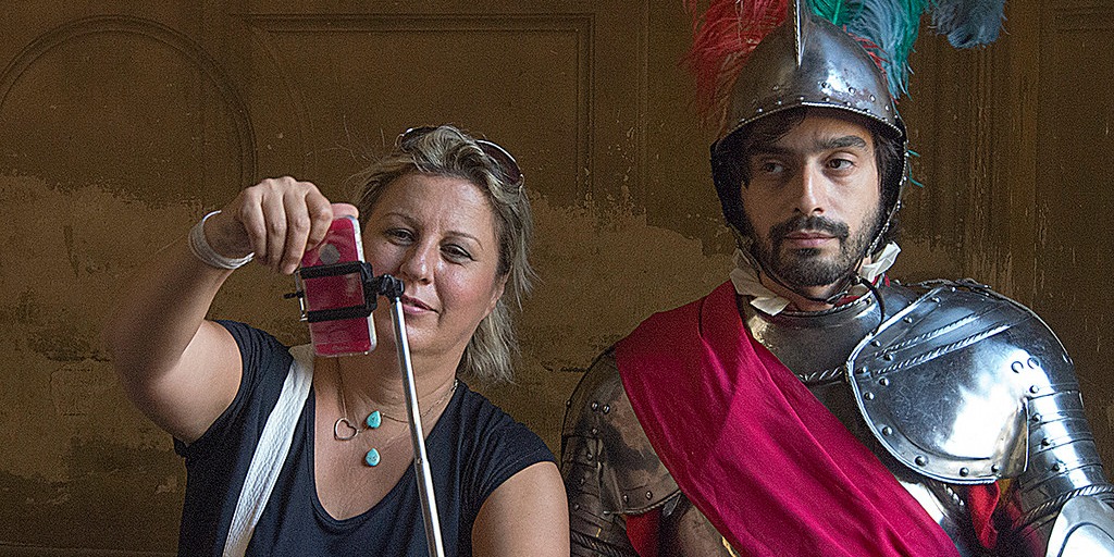 Curse of the Selfie Stick (adapted) (Image by Larry Miller [CC BY-SA 2.0] via flickr)