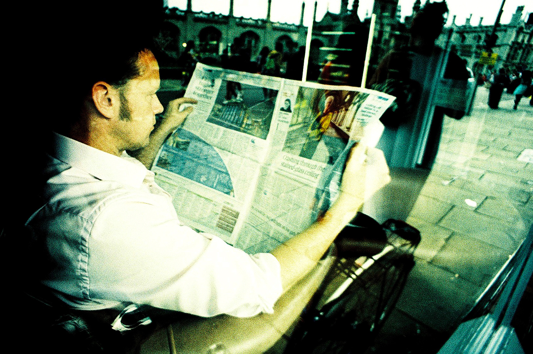 Reading the Newspaper (adapted) (Image by Nick Page [CC BY 2.0] via Flickr)