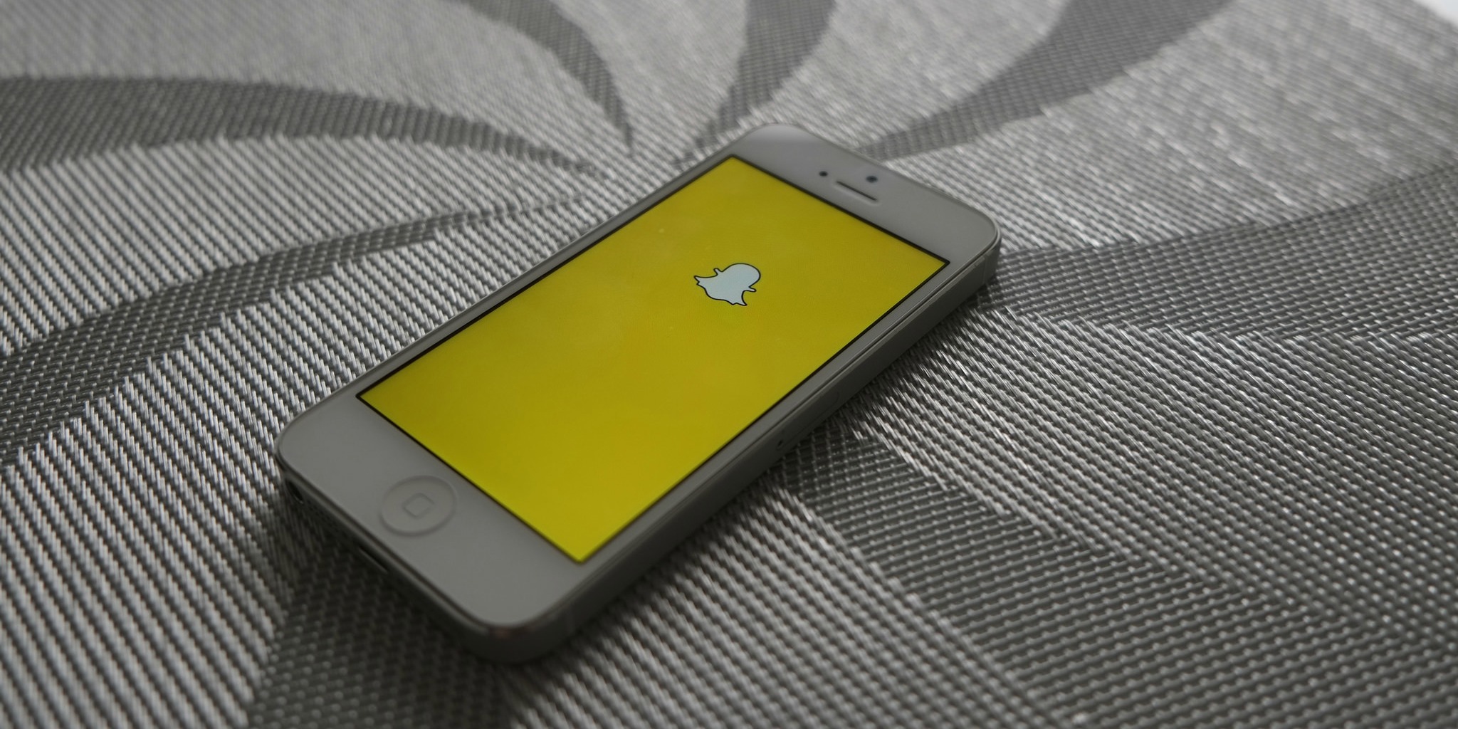 Snapchat (adapted) (Image by AdamPrzezdziek [CC by 2.0] via flickr)
