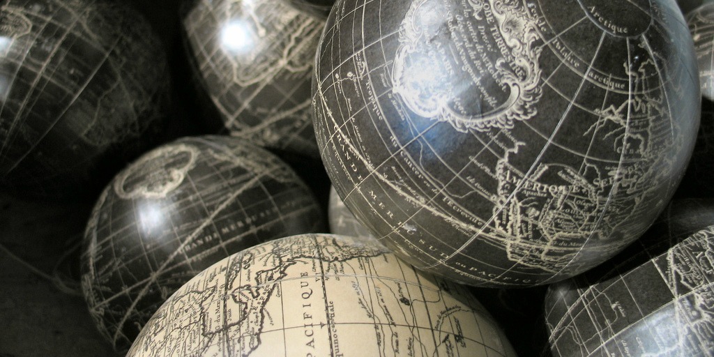 Globes (adapted) (Image by Jayel Aheram [CC BY 2.0] via flickr)