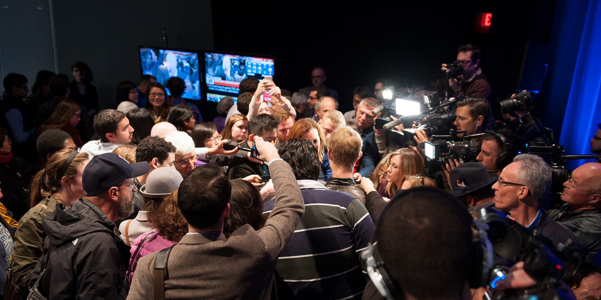 Media Scrum (adpted) (Image by Olivia Chow [CC BY 2.0] via Flickr)