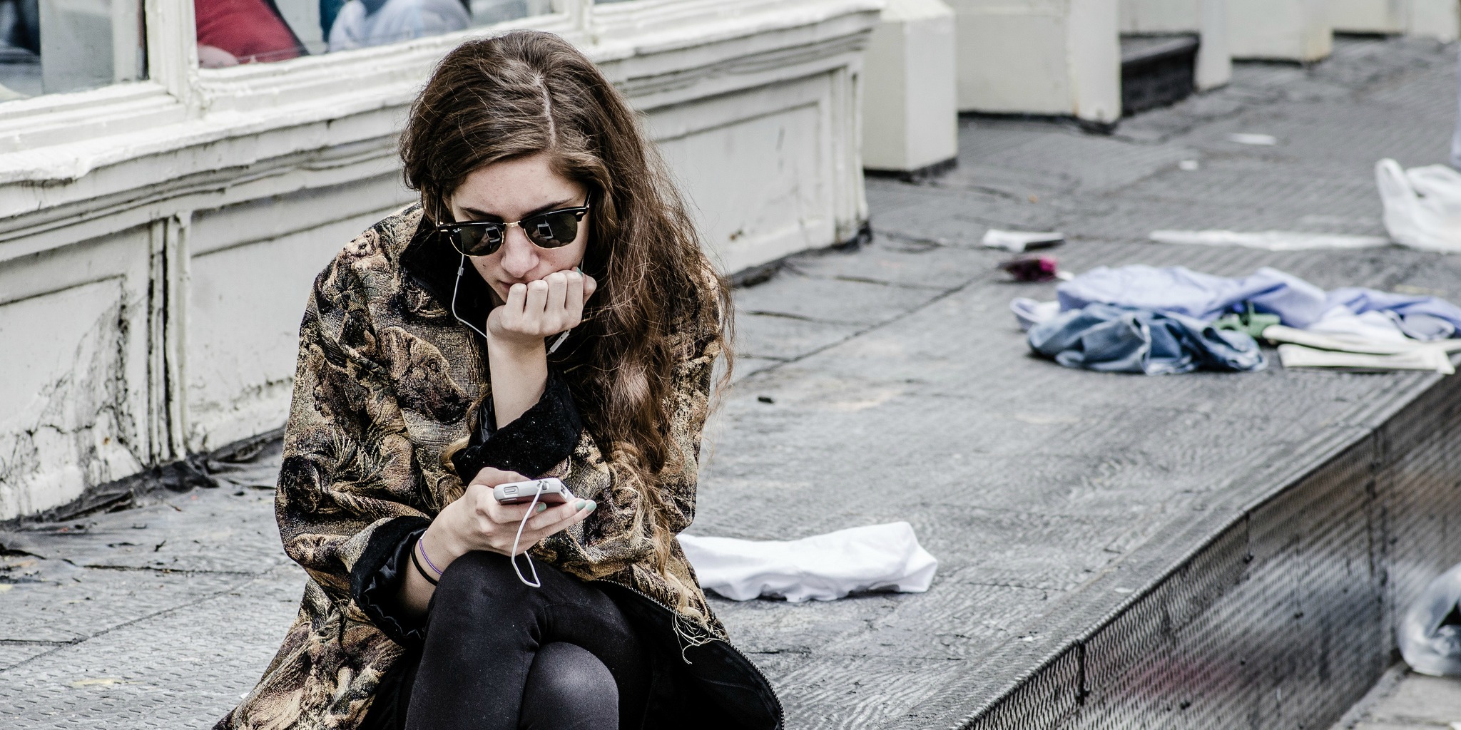 Texting in NYC (adapted) (Image by Michele Ursino [CC BY-SA 2.0] via flickr)