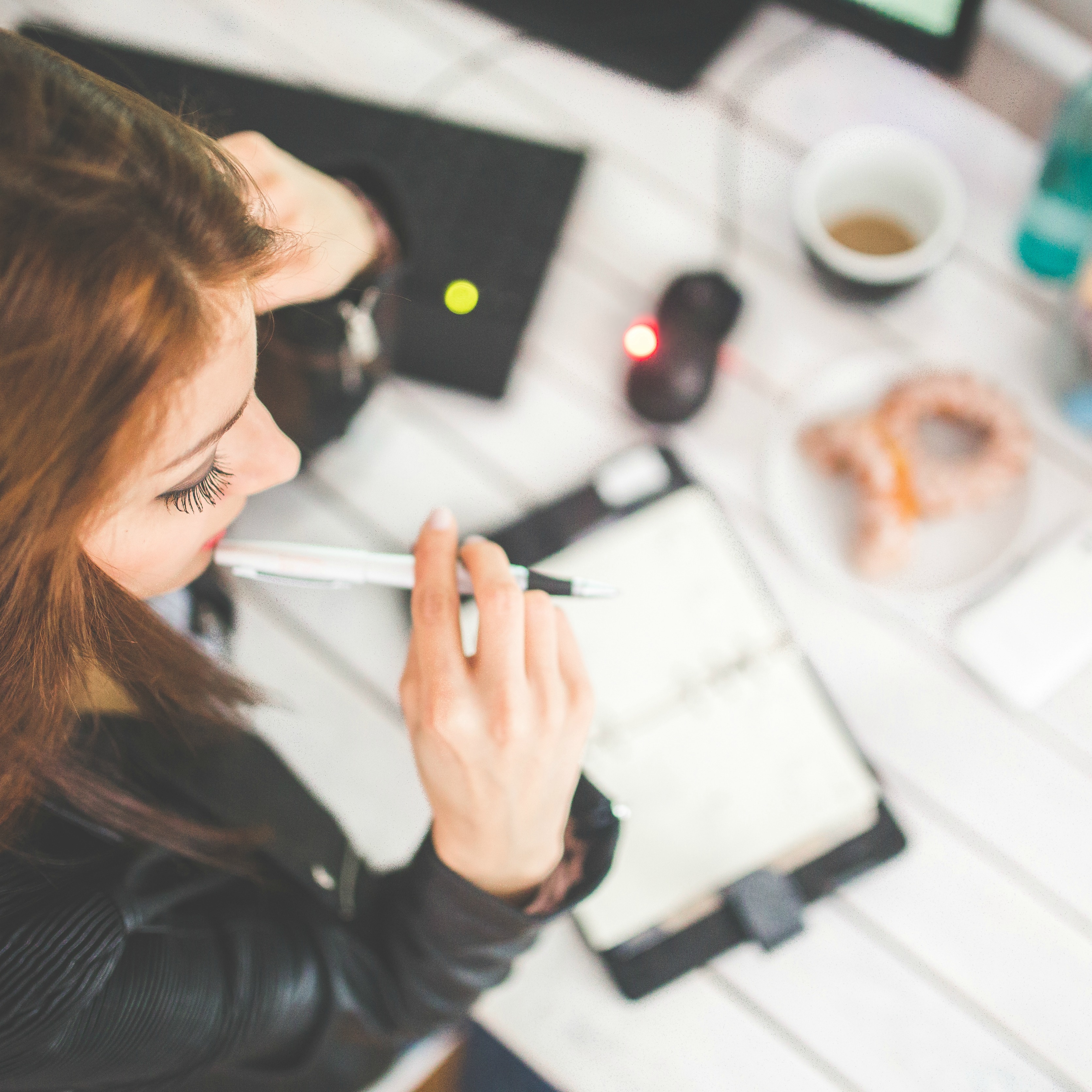 Young woman thinking with pen while working (Image by Karolina Grabowska [CC0 Public Domain] via Pexels)