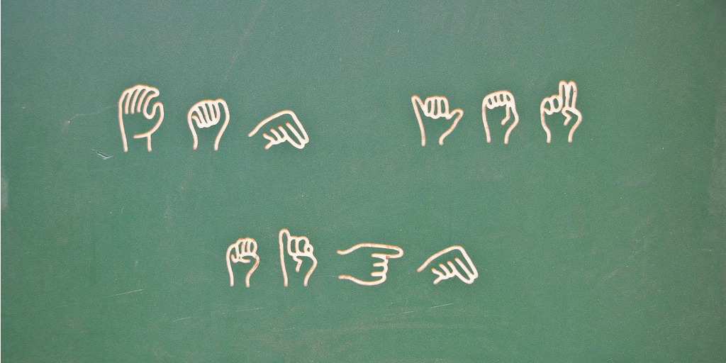 Learn sign language at the playground (adapted) (Image by Valerie Everett [CC BY-SA 2.0] via Flickr)