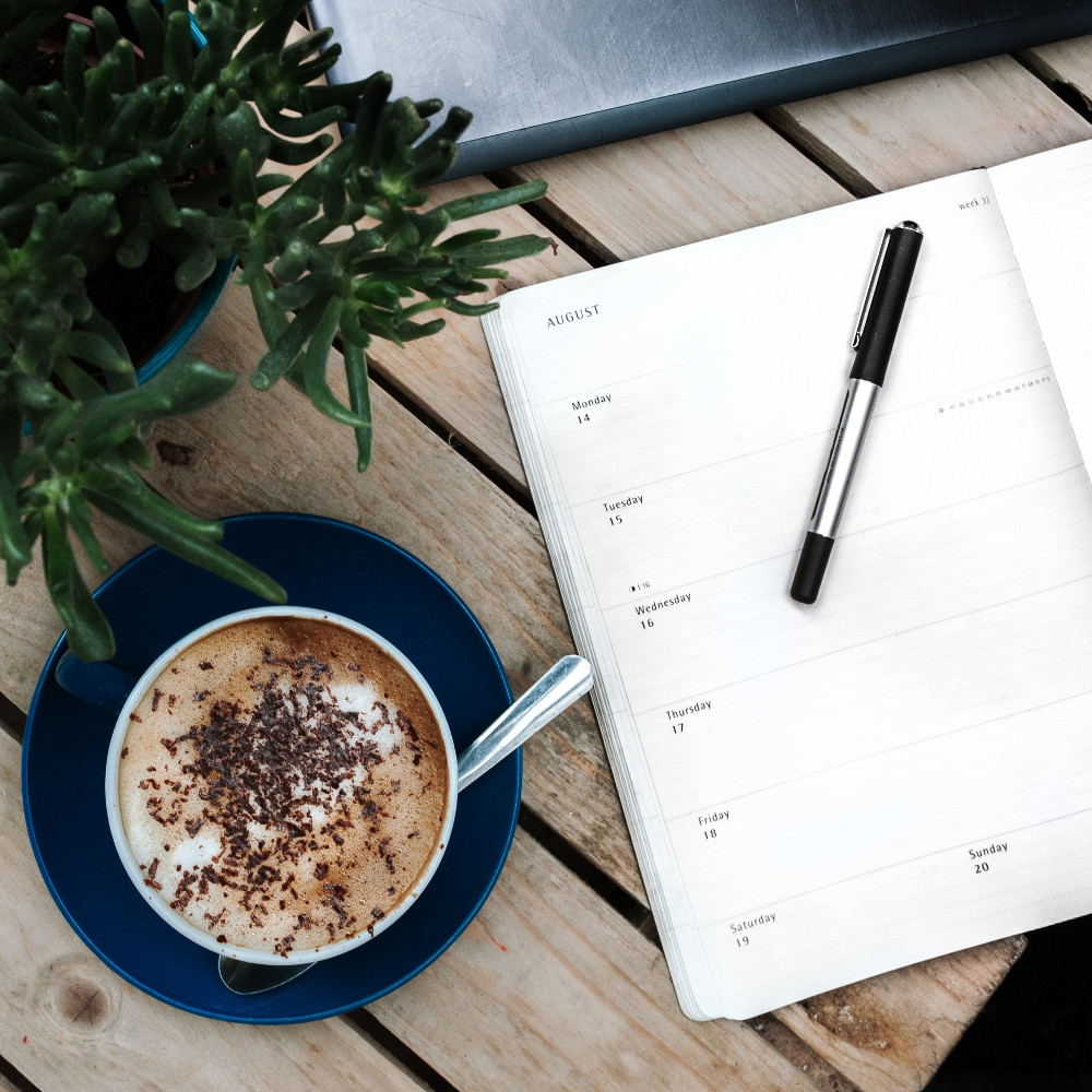 Diary desk business meeting and meeting (Image by Anete Lüsina [CC0 Public Domain] via Unsplash)
