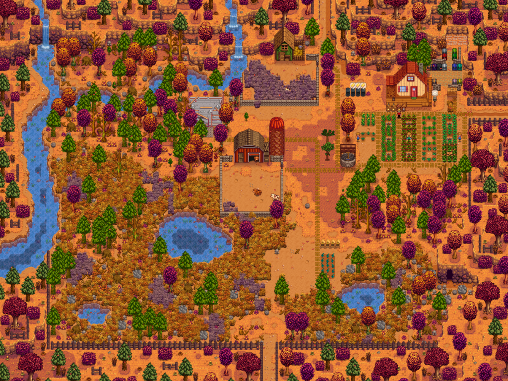 Eine Farm in Stardew Valley im Herbst mit einigen Feldern und zwei Ställen.