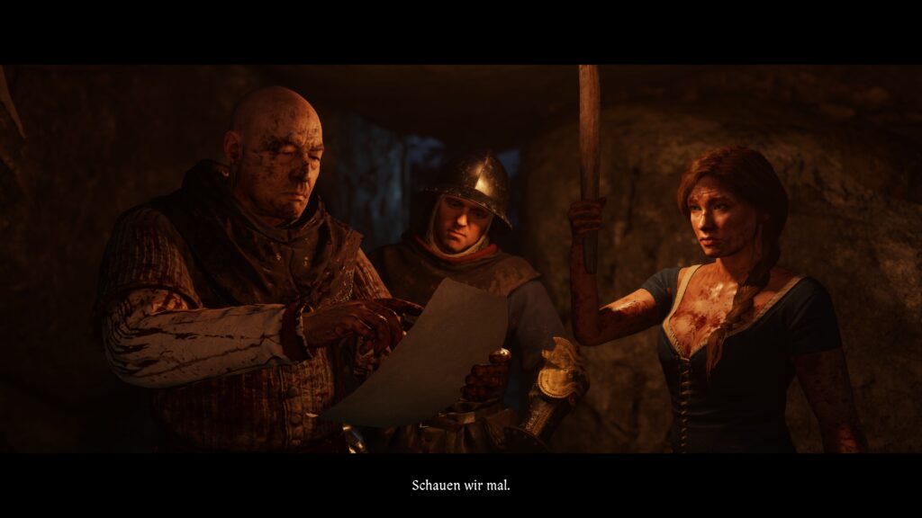 Heinrich, Godwin und Katharina beraten sich in einem unterirdischen Tunnel.